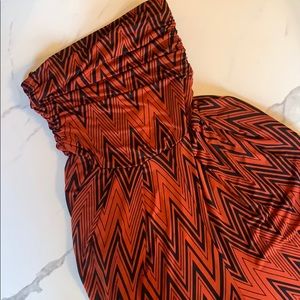 Black and orange sleeveless tribal jumpsuit